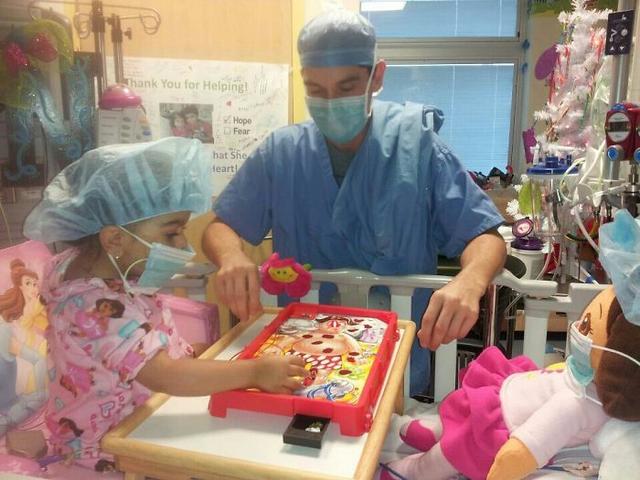 Little kid who wants to become a doctor, playing with her doctor!