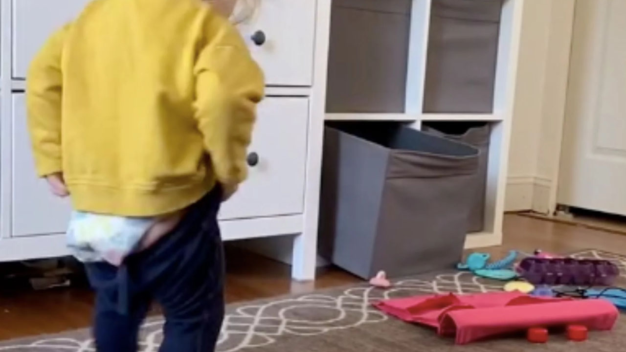 parents regret - video of toddler trying to get her pants on - E