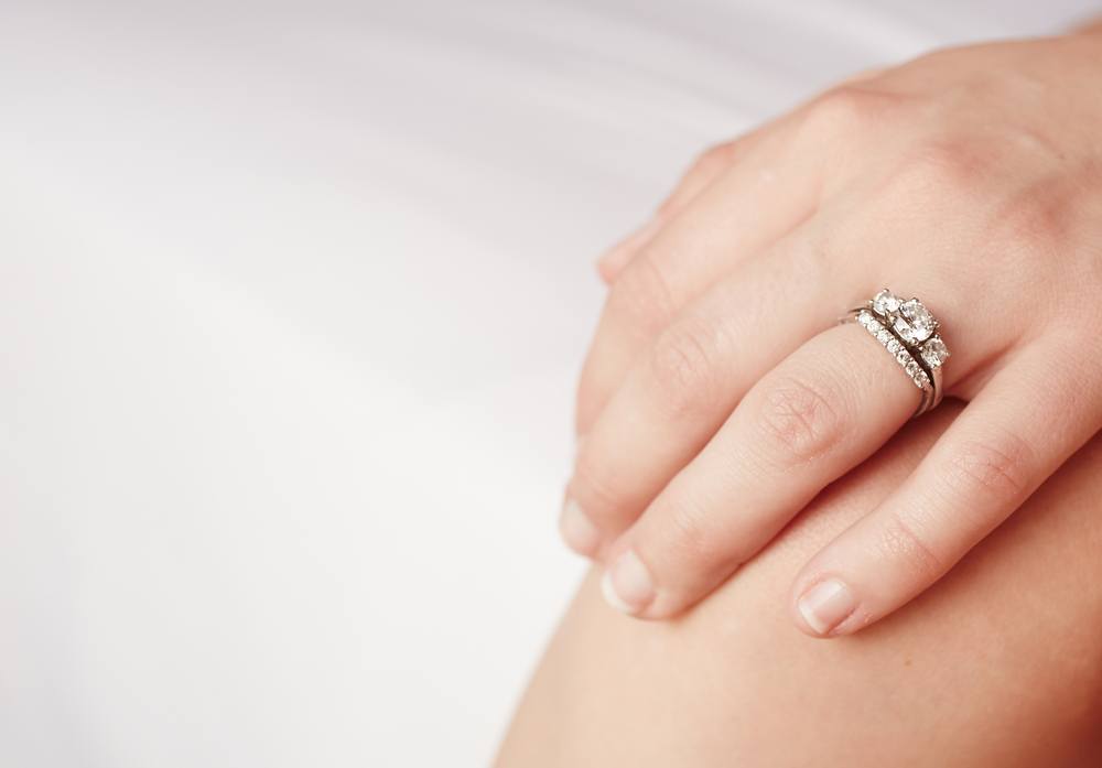 thigns women want men to know - wedding ring on woman's hand - 66
