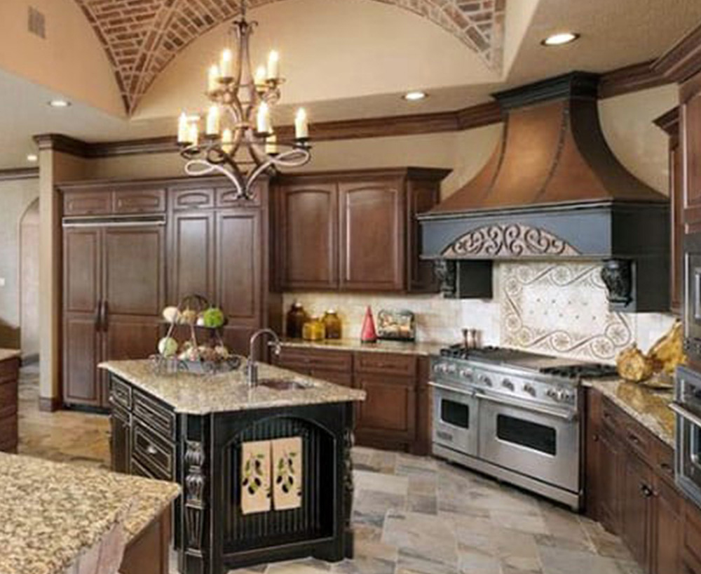 “Brown granite counters in a Tuscan style kitchen.” - Mark072690