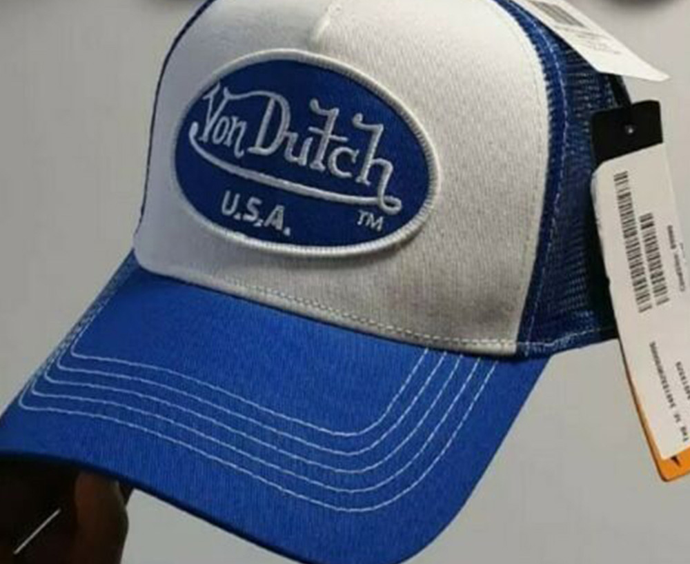 “Von Dutch caps. Oh, team it with a 'chunky belt' over the top of 2 differently coloured long singlets.” - phattoes