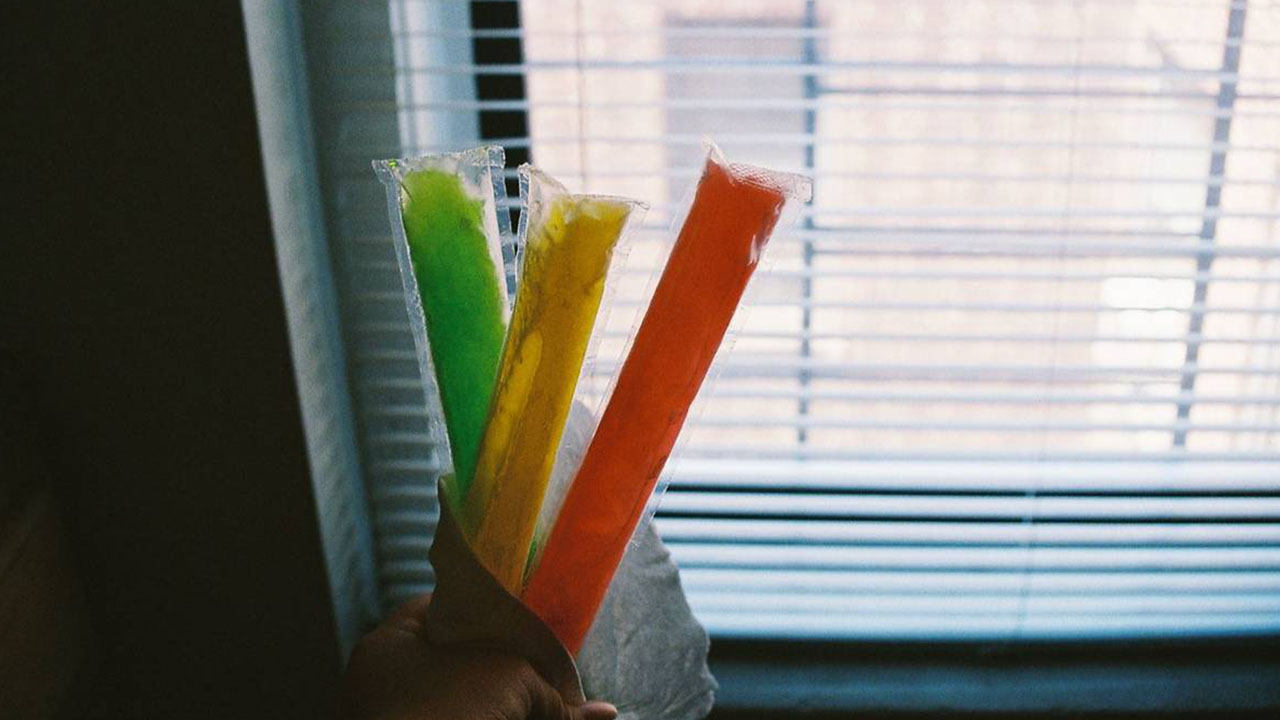 "Eating one of those plastic wrapped ice pop things after a long day of playing outside in your backyard with your friends." - onyourleft___