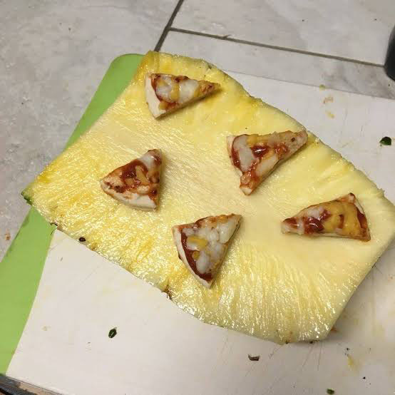 worst of humanity - pizza on pineapple
