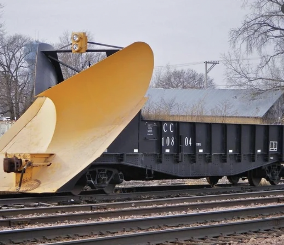 A snow plow train car for clearing tracks in the winter.