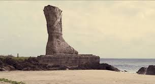 remains of the statue of helios his foot