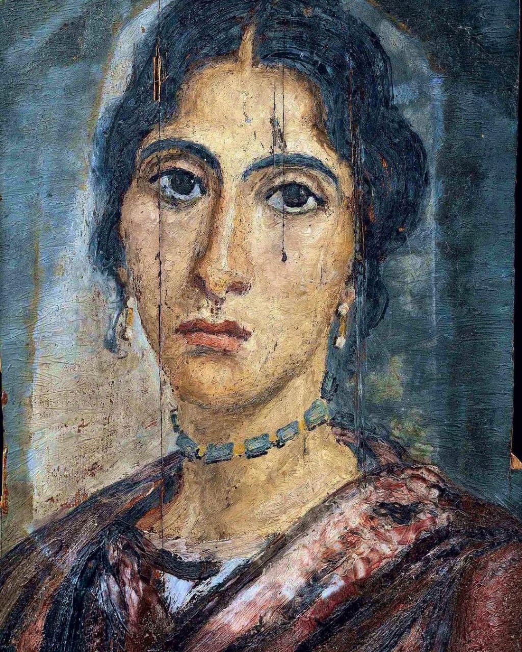 mummy portrait of an egyptian woman 50 bc wearing greek clothes