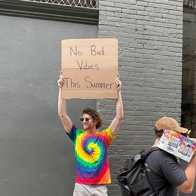 dude with sign 4