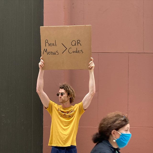 dude with sign 21