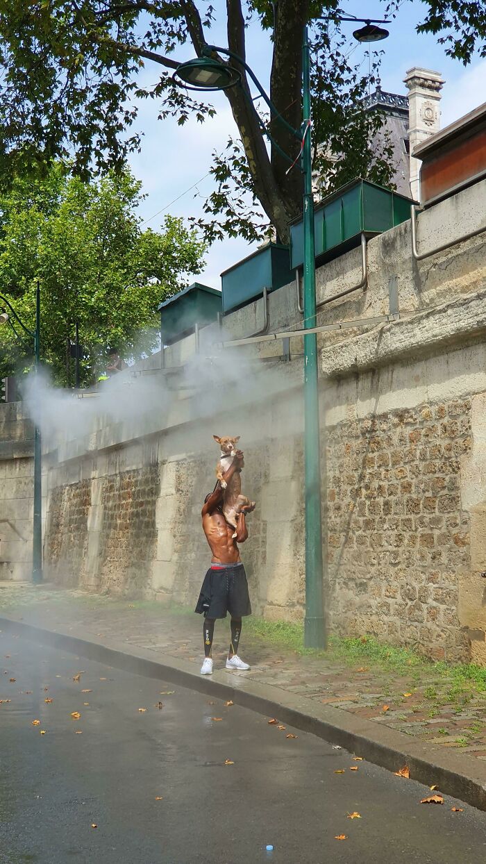 I Spotted This Guy In Paris Helping His Pupper Cool Off In The 40°C Heatwave