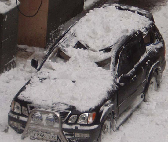 Snow Fall Crushes Car