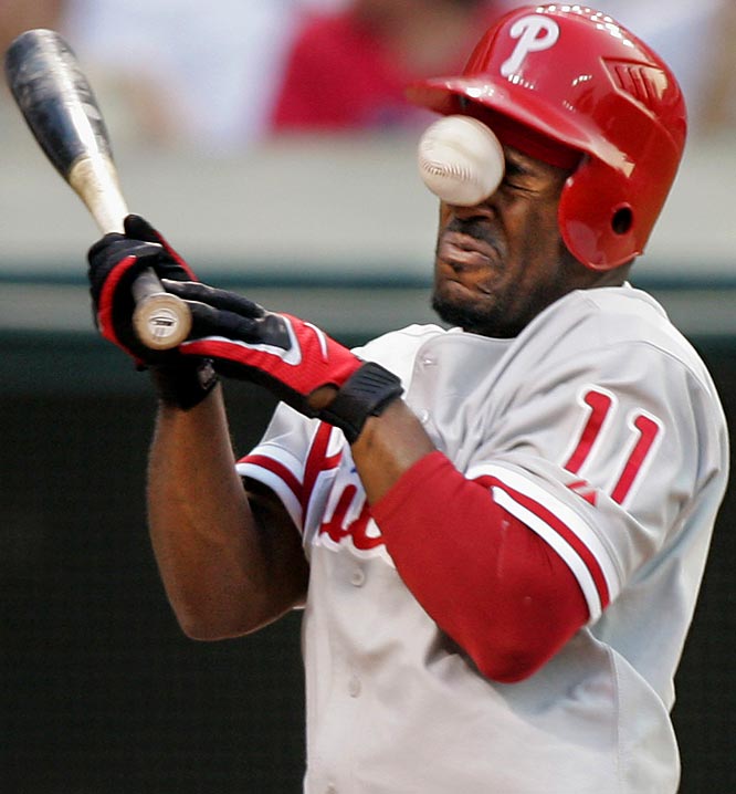 Jimmy Rollins gets hit in the face with a baseball