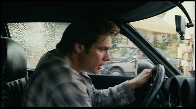 Bruce Almighty (2003) - Camera man visible through windshield. [31:47]