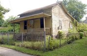 Located in Saginaw, the vacant home went to the high bidder....a 30 year old woman in Chicago who plans to try and sell it for a profit. The foreclosed home comes with about 850 in back taxes and yard cleanup costs. Good luck flipping this one lady!