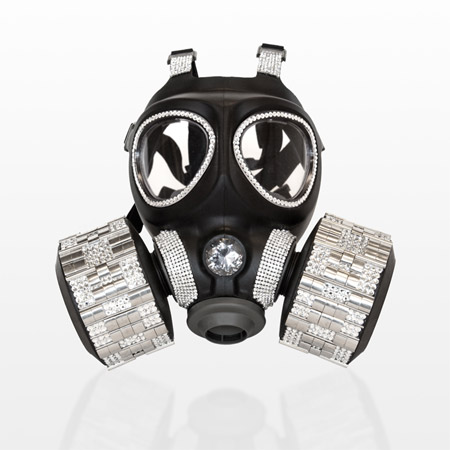 This is a set of designer gas masks made for rich people that need protection from lethal gases in the coming apocalypse. Because if there's one thing I've learned in life, it's that Louis Vuitton accessories are a must when you've been attacked with poison gas. Unfortunately these are not real commercial products, they're gallery pieces