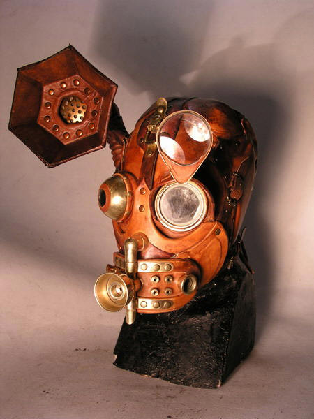 This rather disturbing object is called the Steampunk Gas Mask 9. It marries the compulsory Steampunk materials, leather and brass, with a genuine Soviet-era gas mask. As an object, it is beautiful, and exquisitely crafted.