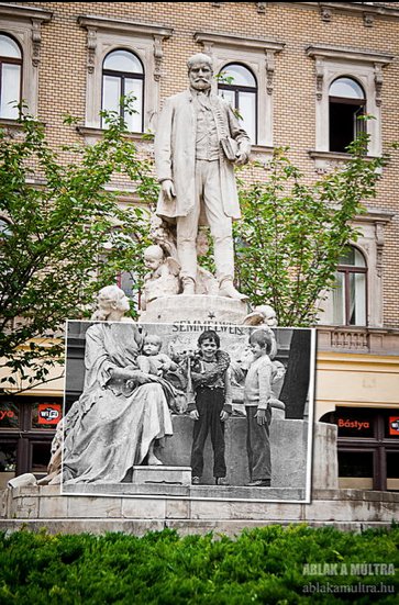 In 2012, the statue in Budapest looked the same, but the kids playing there were photographed in 1975.
