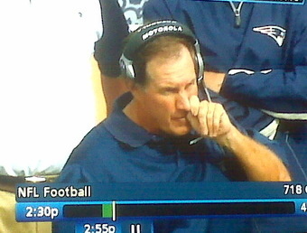 Pic of Bill Belichick picking his nose.