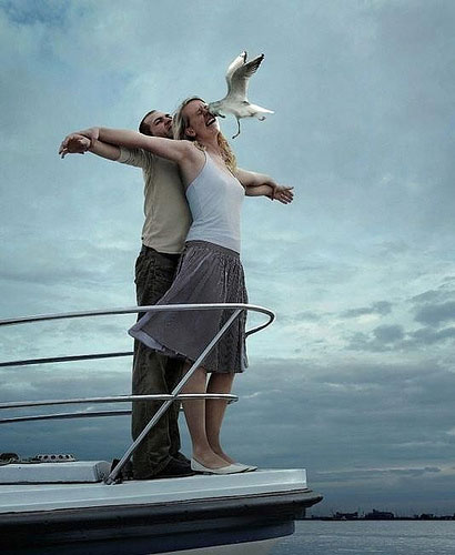 a couple tries to reenact the scene from the titanic...and it doesn't go so well