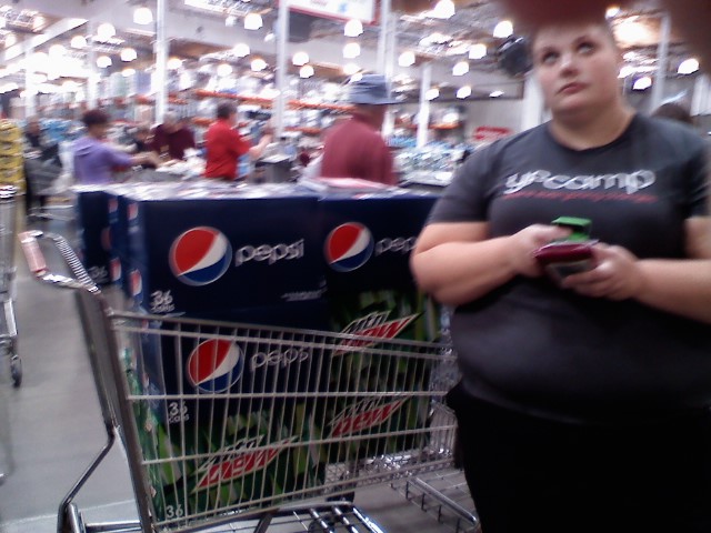 I guess she needed a cart full of soda after all the free samples at Costco.