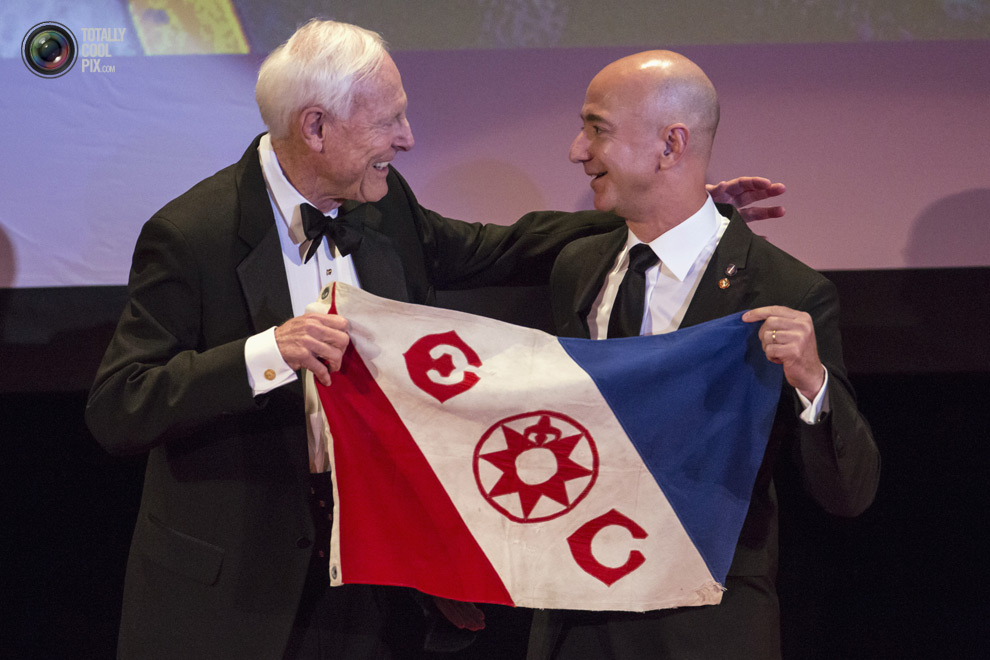 CEO and chairman of Amazon return the Explorers flag back to club