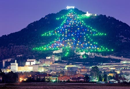 The world's largest Christmas tree display rises up the slopes of Monte Ingino outside of Gubbio, in Italy 's Umbria region. Composed of about 500 lights connected by 40,000 feet of wire, the 'tree' is a modern marvel for an ancient city.