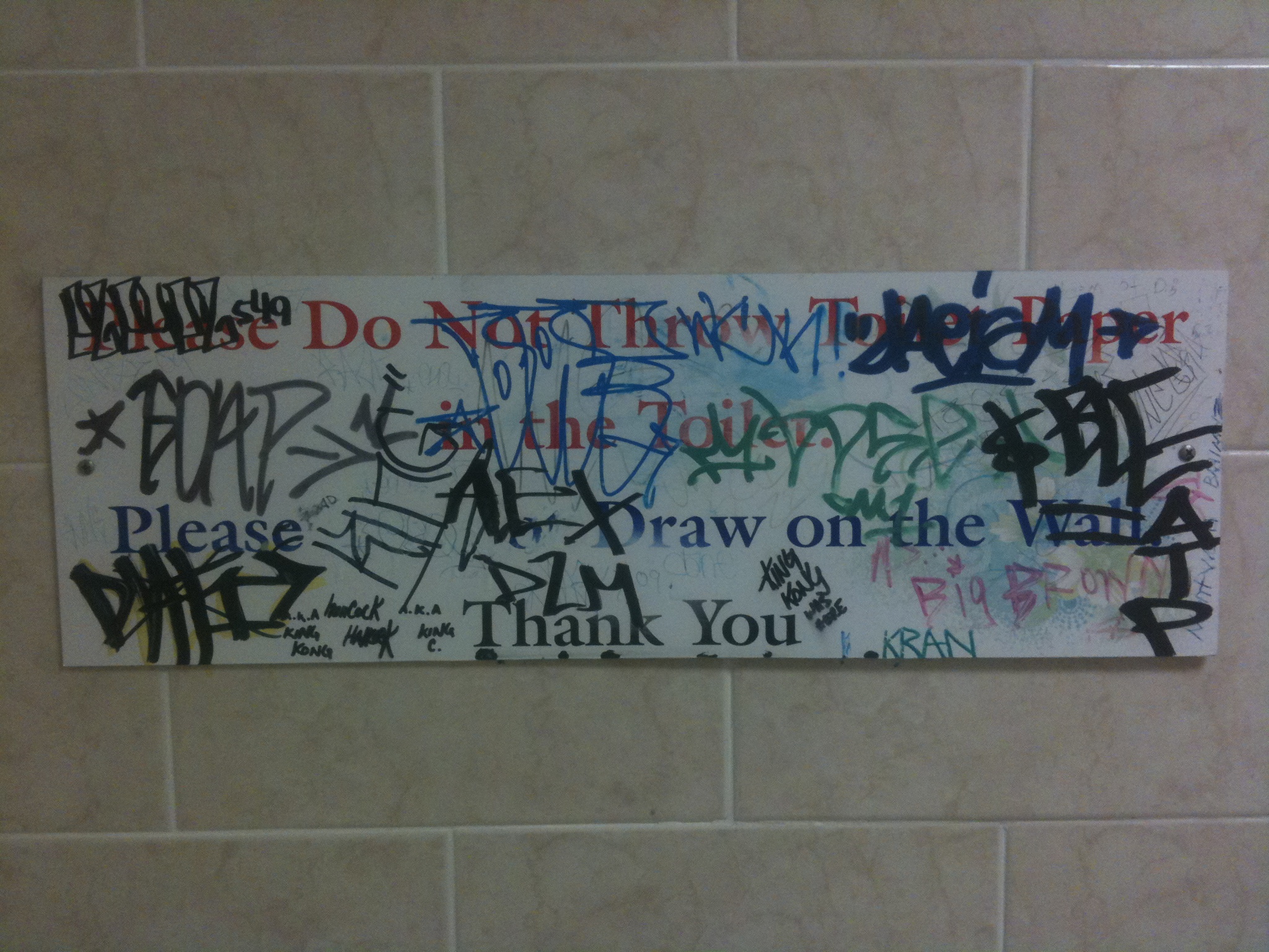 Bathroom wall of a haircut place in Philly. Technically they obeyed the sign. 