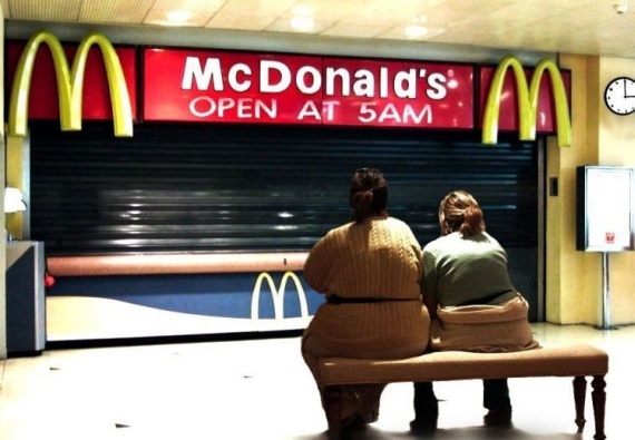 These two poor, starving girls are patiently waiting for McDonalds to open