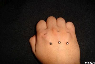 Hand piercings