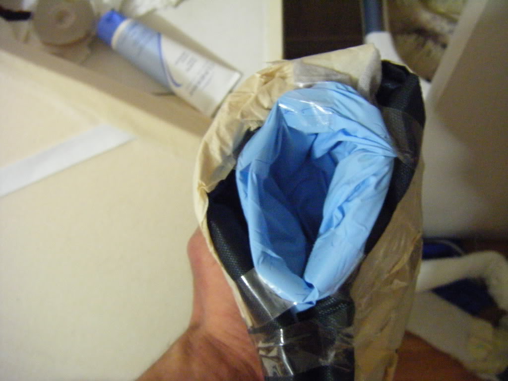 placed a disposable glove over top for the actual screwhole... this way i could cum into it and then replace the glove easily.