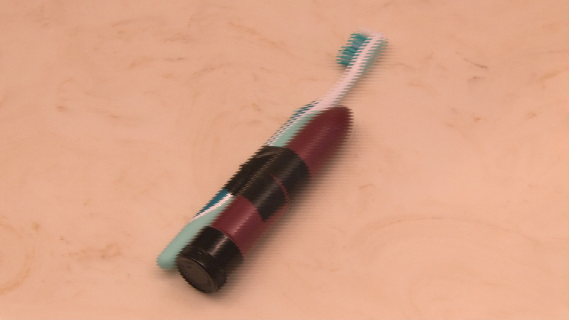 Make your own electric toothbrush with a vibrator