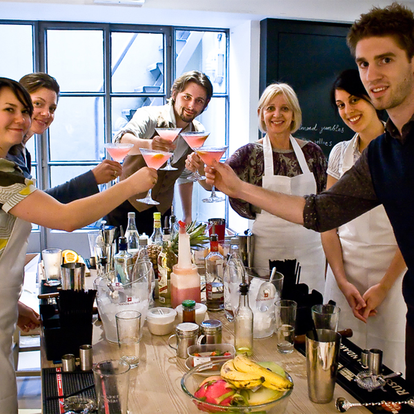 Fun Friday night activity - group of people taking a cocktail making class