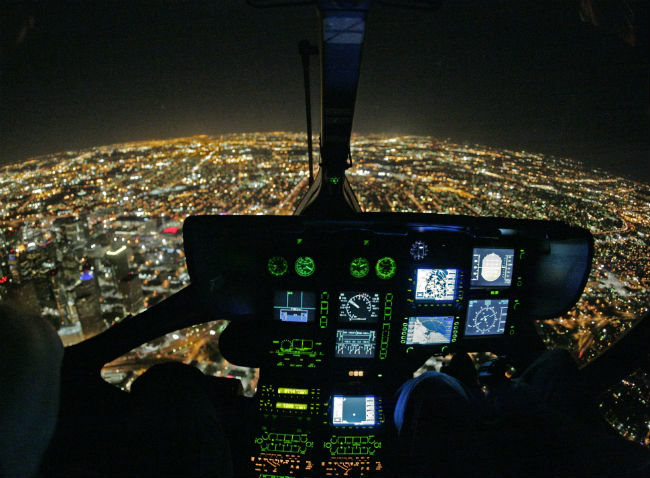 Forget limo tours, take a night tour of your city in a helicopter.