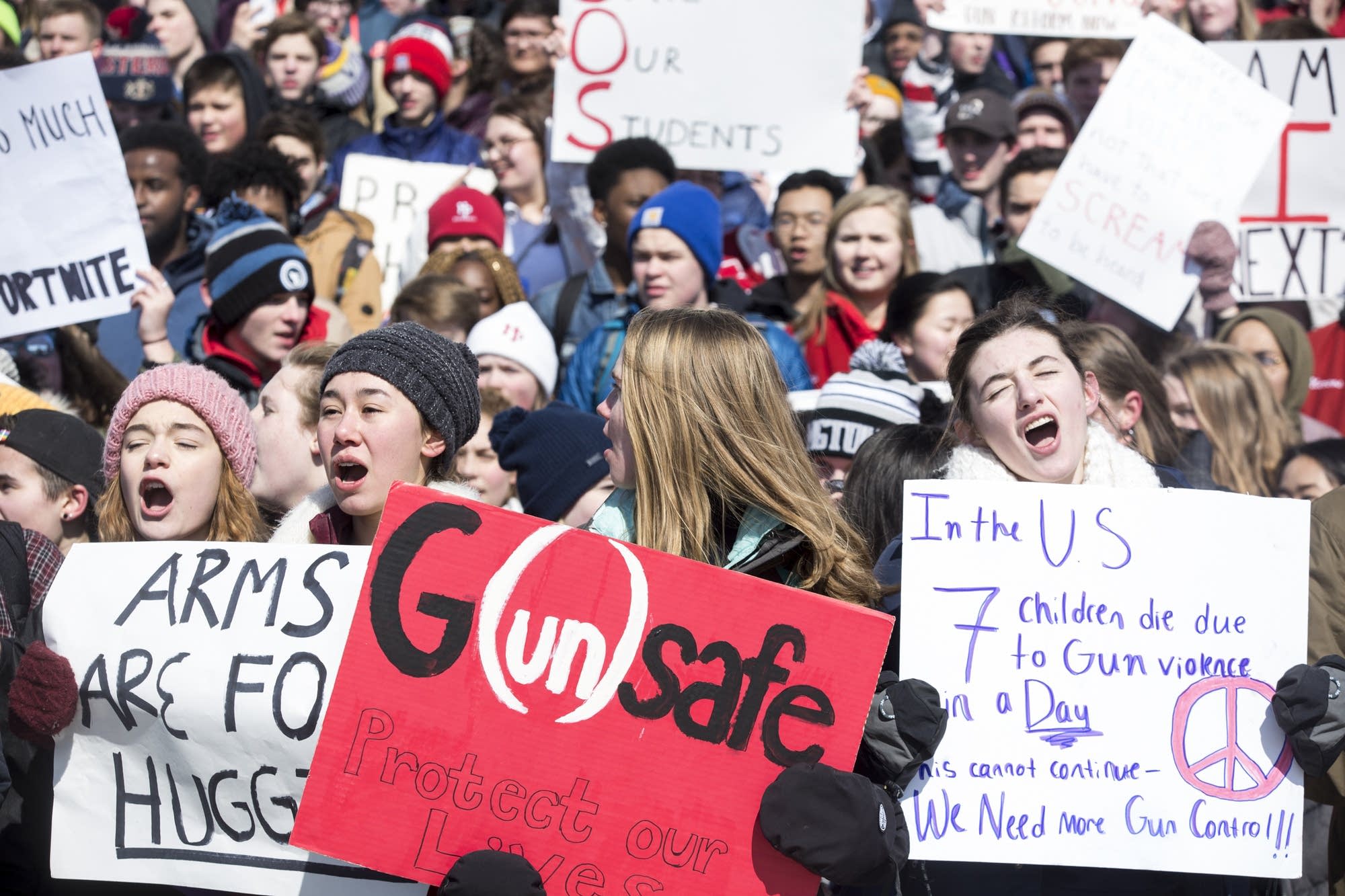 Kids walkout of schools to protest guns with creative signs