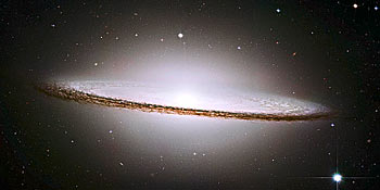 The Sombrero Galaxy - 28 million light years from Earth - was voted best picture taken by the Hubble telescope. The dimensions of the galaxy, officially called M104, are as spectacular as its appearance.  It has 800 billion suns and is 50,000 light years across. 