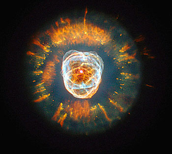 In third place is Nebula NGC 2392, called Eskimo because it looks like a face surrounded by a furry hood. The hood is, in fact, a ring of comet-shaped objects flying away from a dying star. Eskimo is 5,000 light years from Earth. 
