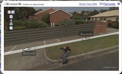 As this guy sleeps off being wasted, a car-mounted video camera passed by to record pictures of the street for Google's StreetView website.