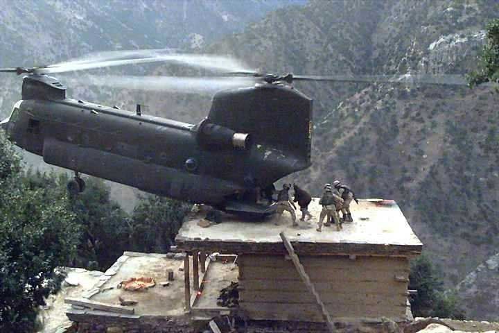 This photo was taken by a soldier in Afghanistan of a helo rescue mission. The pilot is a PA National Guard guy who flies EMS choppers in civilian life. 

Now how many people on the planet you reckon could set the ass end of a chopper down o n the roof top of a shack, on a s teep mountain cliff, and hold it there while soldiers load wounded men i