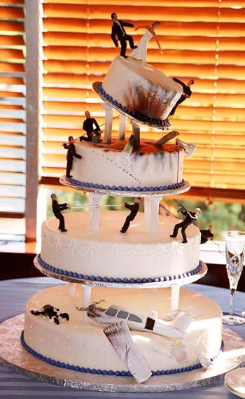 Wedding cake with couple and two best men Stock Photo - Alamy