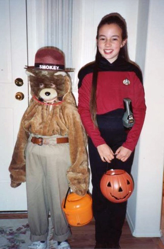 This poor kid dressed up as an elderly Smokey the Bear.