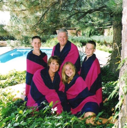 "Hey, let's all get in matchin towels and get our pictures made in the weeds that are about 40 yards from the pool."