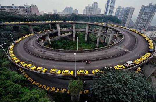 vehicles line up to receive natural gas in Chongqing, China
