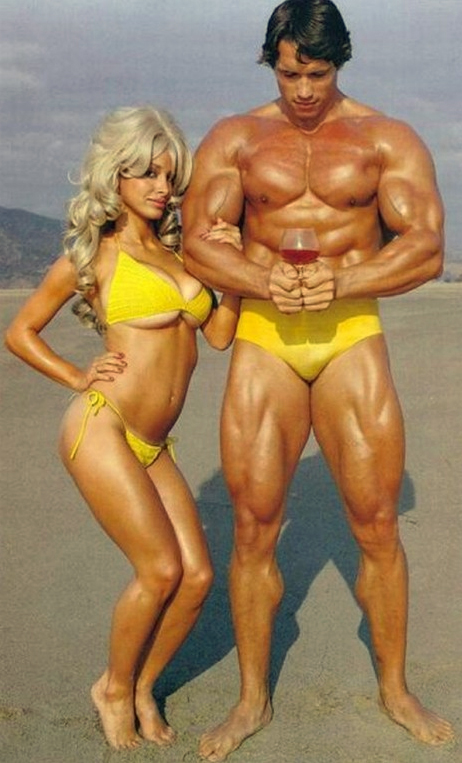muscle head plus hot chick with a groovy wig