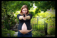You can't have enough pregnancy and gun pictures.