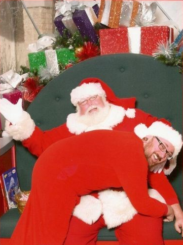 Santa spanks a retarded elf