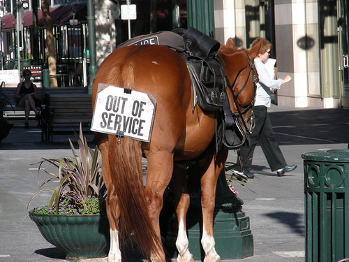 I thought this was funny, why would you leave your horse if your police jsut standing around and put a sign on its ASS that says out of service...like its a toliet??