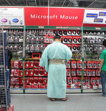 Sumo wrestlers shopping.