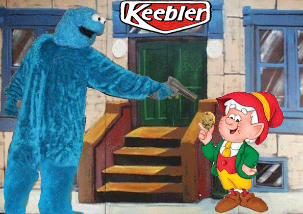 Cookie monster holding up the Keebler Elf.
