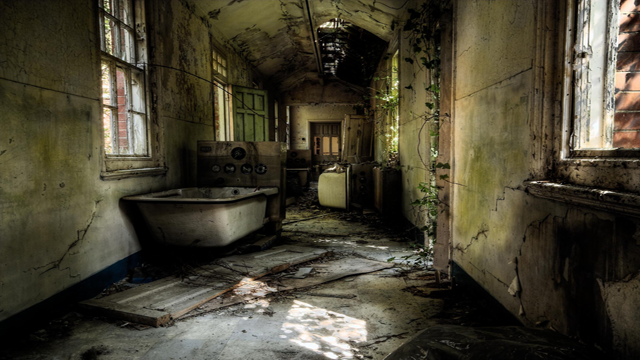 Hellingly Hospital in East Sussex, England is a real life insane asylum straight out of a horror movie. It opened in 1903 and lobotomized and electrocuted it's patients for 90 years until it was finally shut down. The building has been abandoned since 1994. Every year, a few photographers are brave enough to visit Hellingly Hospital. The pictures are right out a nightmare.