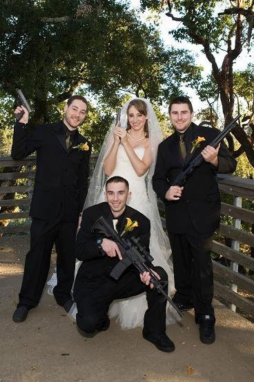 We're not sure if these guys got married on a paintball farm or if this photo embodies everything that may be wrong with this society. Redneck Randal approves.
