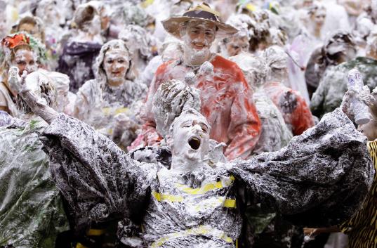 Foam Fight. St. Andrews University's traditionally rowdy student 'Raisin weekend' celebrations reached their climax this week with the customary foam fight in St. Salvators Quad on the town's coastline., November 2013